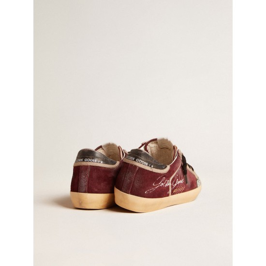 Women’s Super-Star Penstar LAB in burgundy suede with perforated star
